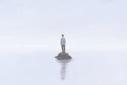 Man alone on an tiny island | ILLUSTRATION © JORM SANGSORN