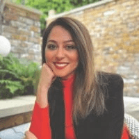 Woman in red shirt smiling